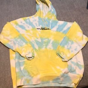 HUF tie dye sweatshirt, discoloration near logo
